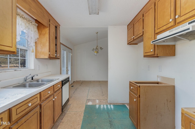 kitchen featuring vaulted ceiling, dishwasher, sink, hanging light fixtures, and a textured ceiling