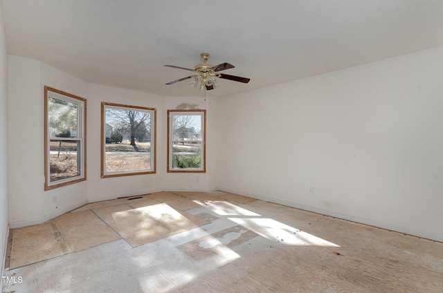 empty room featuring ceiling fan