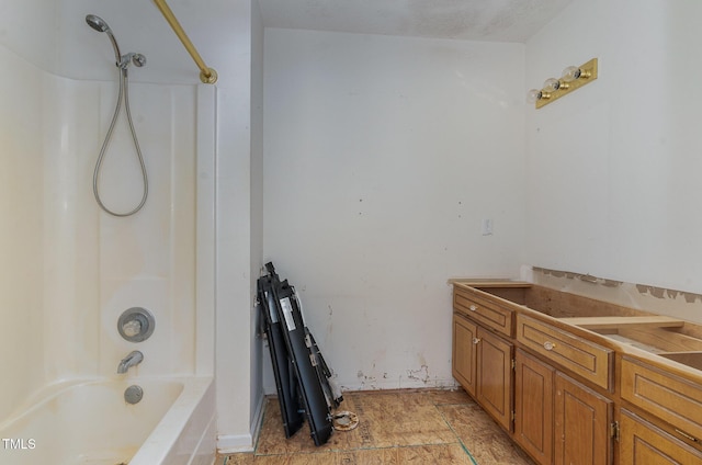 bathroom with shower / bathtub combination and vanity