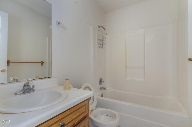 full bathroom featuring toilet, vanity, and bathing tub / shower combination