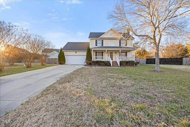 view of front of home featuring a porch, a front lawn, and a garage