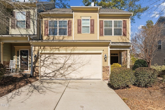 view of front of property featuring a garage