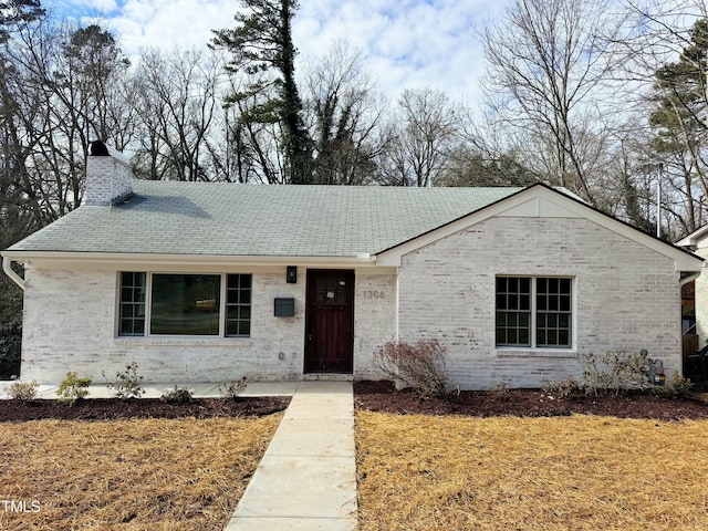 view of front of home with a front lawn