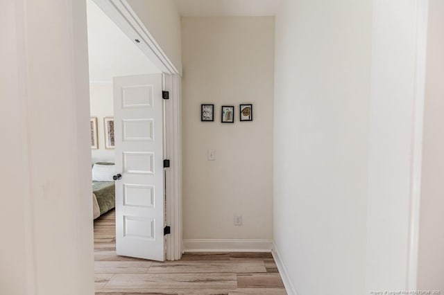 hallway featuring light hardwood / wood-style floors