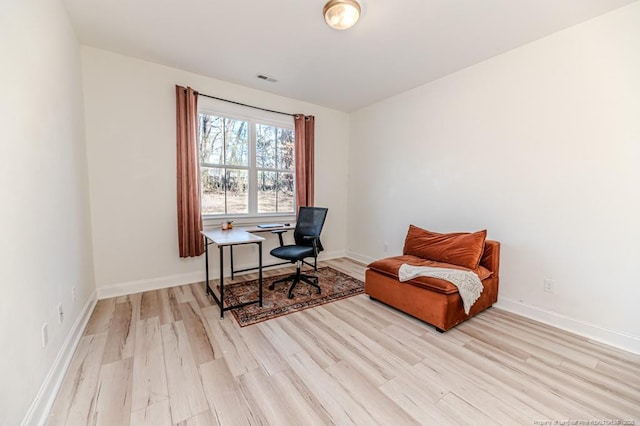 office space featuring light hardwood / wood-style floors