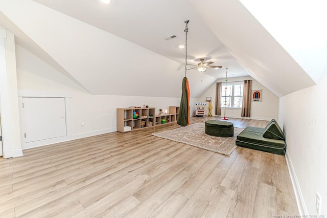 bonus room featuring lofted ceiling, ceiling fan, and light wood-type flooring