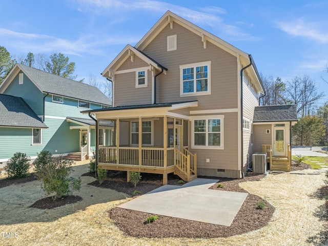 rear view of house featuring crawl space, covered porch, and central AC