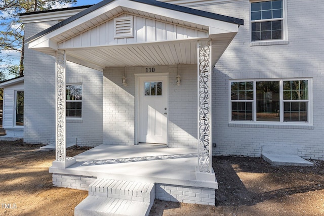 property entrance with a porch