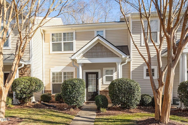 view of property featuring a front yard