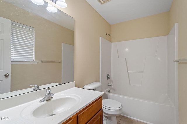 full bathroom featuring shower / bathtub combination, tile patterned floors, vanity, and toilet