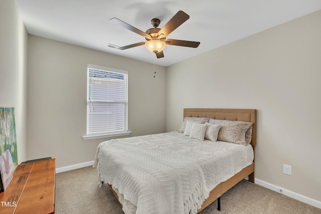 bedroom with ceiling fan and carpet flooring