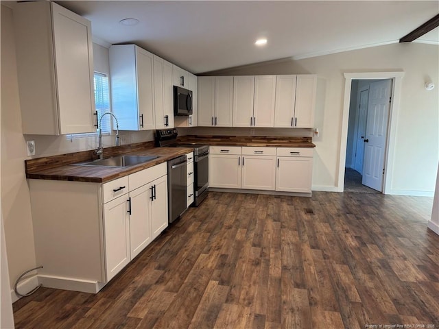 kitchen featuring sink, white cabinetry, vaulted ceiling, dishwasher, and electric stove