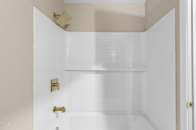 bathroom with shower / bath combination