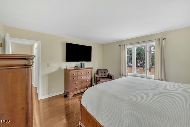 bedroom with light wood-type flooring