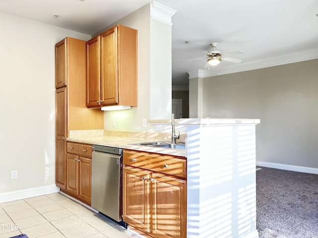 kitchen featuring sink, light tile patterned flooring, ceiling fan, stainless steel dishwasher, and crown molding