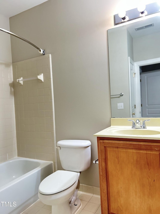 full bathroom featuring shower / bathing tub combination, toilet, vanity, and tile patterned flooring