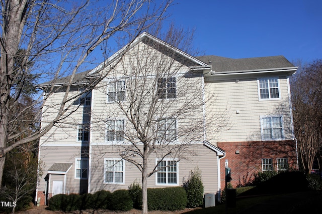 view of home's exterior featuring cooling unit