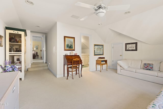 living room featuring ceiling fan, built in features, light carpet, and lofted ceiling