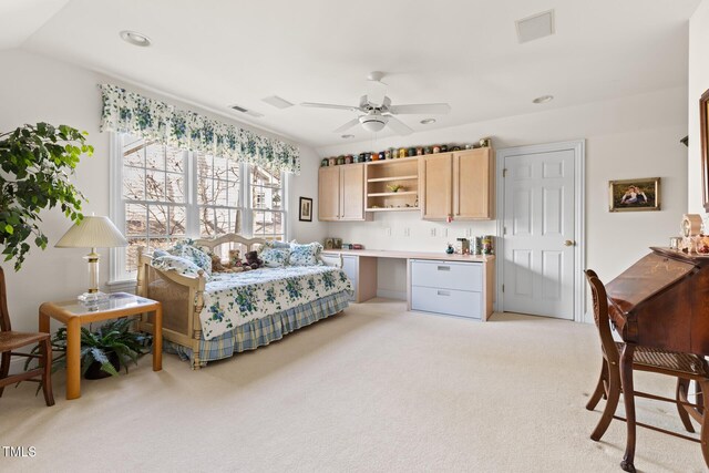 carpeted bedroom featuring lofted ceiling and ceiling fan