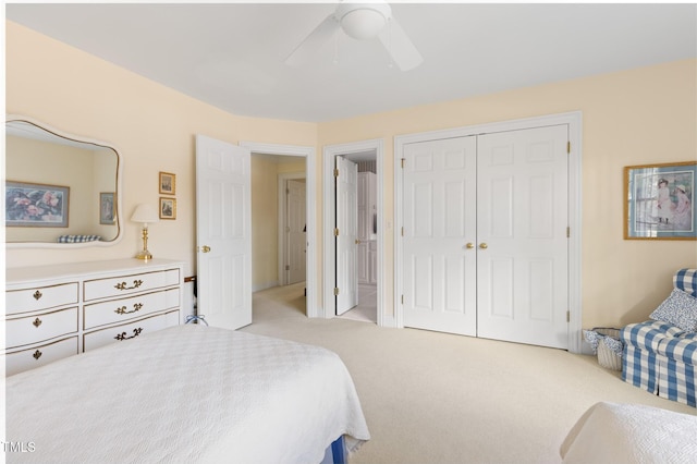 bedroom with light carpet, a closet, and ceiling fan