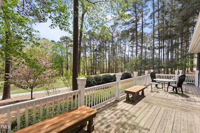 deck with outdoor dining space
