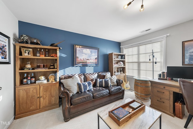 living room featuring light colored carpet