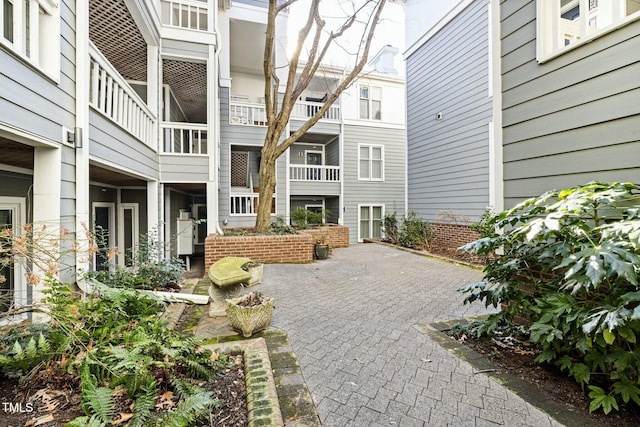 surrounding community featuring a patio