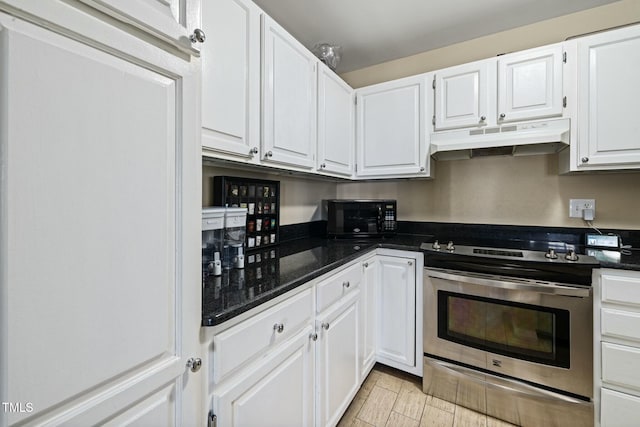 kitchen featuring white cabinets and stainless steel electric range