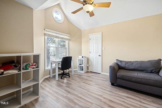 office featuring ceiling fan, lofted ceiling, and light hardwood / wood-style floors