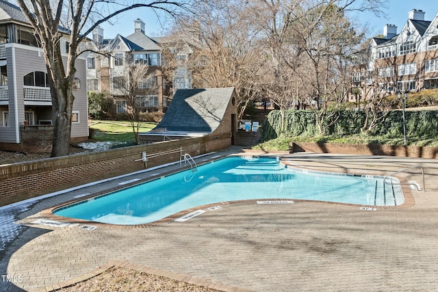 view of pool featuring a patio area