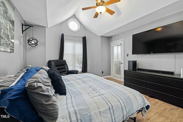 bedroom with ceiling fan, multiple windows, and light wood-type flooring