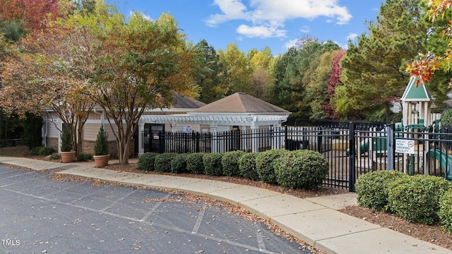 view of home's community featuring a playground