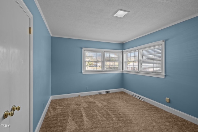 carpeted spare room with ornamental molding