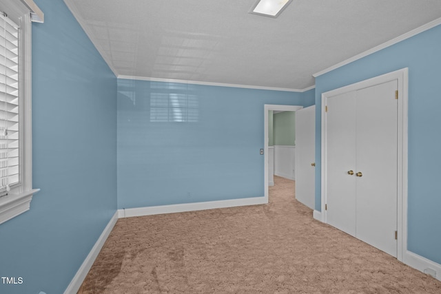 unfurnished bedroom featuring light carpet and ornamental molding