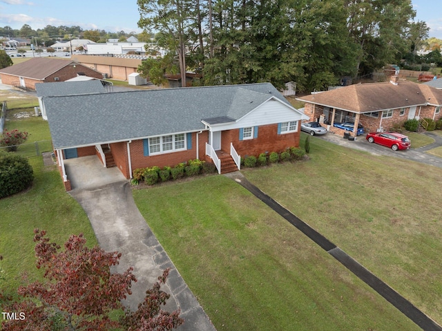 ranch-style home with a front lawn