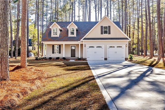 view of front facade with a front lawn and a garage