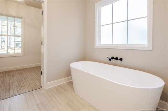 bathroom featuring a tub