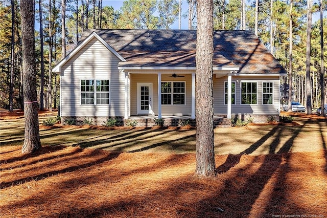 single story home with a front lawn and a porch