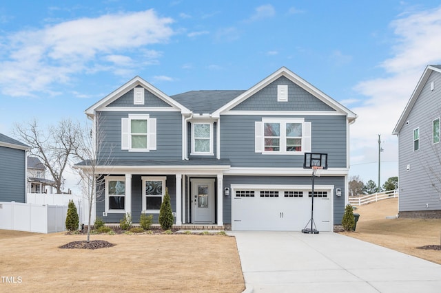 view of front of home featuring a garage and a front lawn