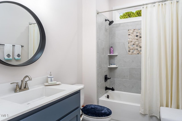 full bathroom featuring shower / tub combo with curtain, vanity, and toilet