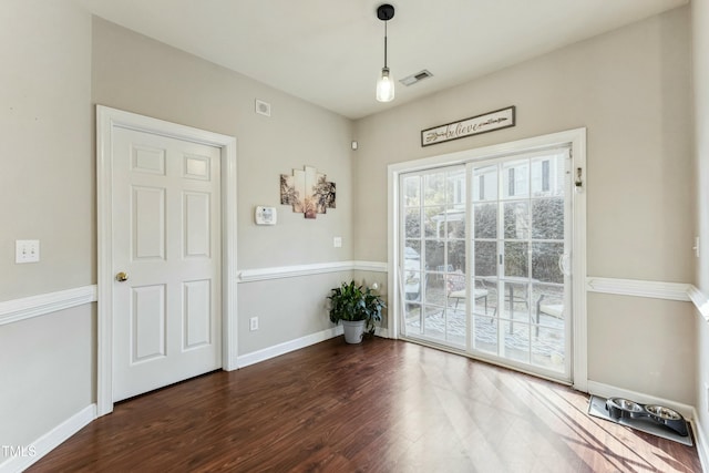 interior space with dark hardwood / wood-style floors