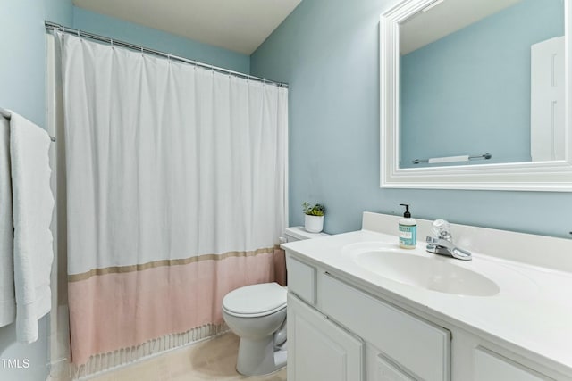 bathroom featuring toilet, a shower with curtain, and vanity