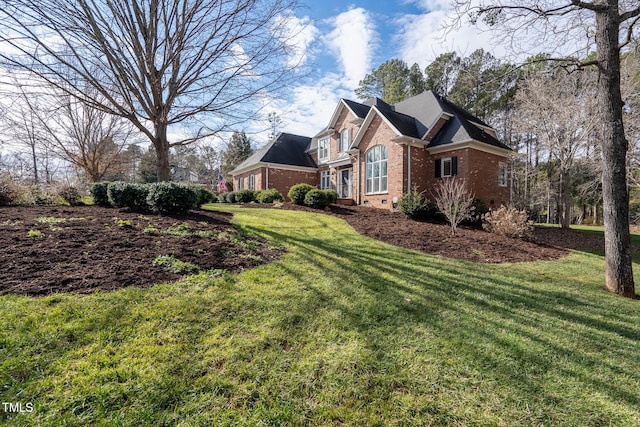 view of property exterior with a lawn