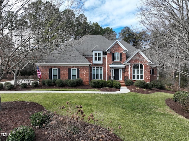 view of front of house with a front lawn