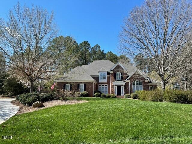 view of front of home with a front yard