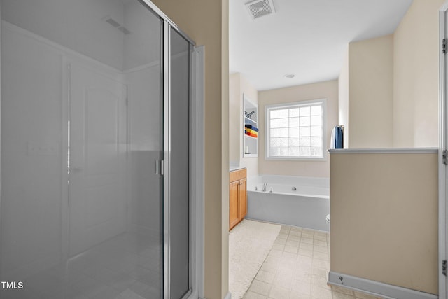 bathroom with shower with separate bathtub and vanity