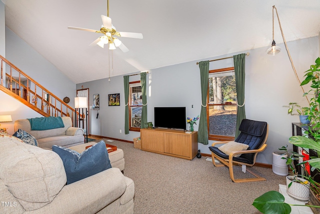 living room featuring ceiling fan, light colored carpet, and vaulted ceiling