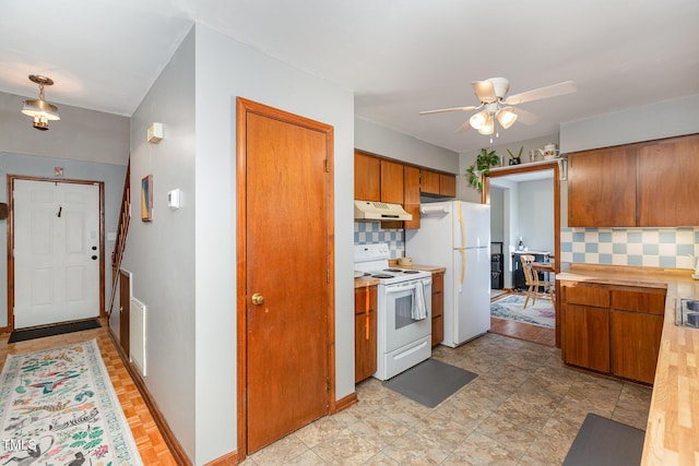 kitchen with ceiling fan, white appliances, and tasteful backsplash