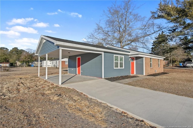 view of front of house with a carport