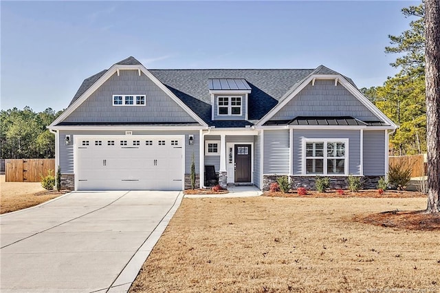 craftsman-style home with a garage